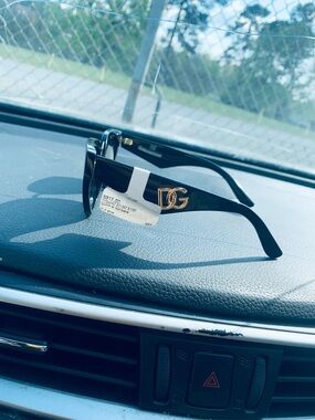 Dolce & Gabbana Black Sunglasses with Gold DG Emblem